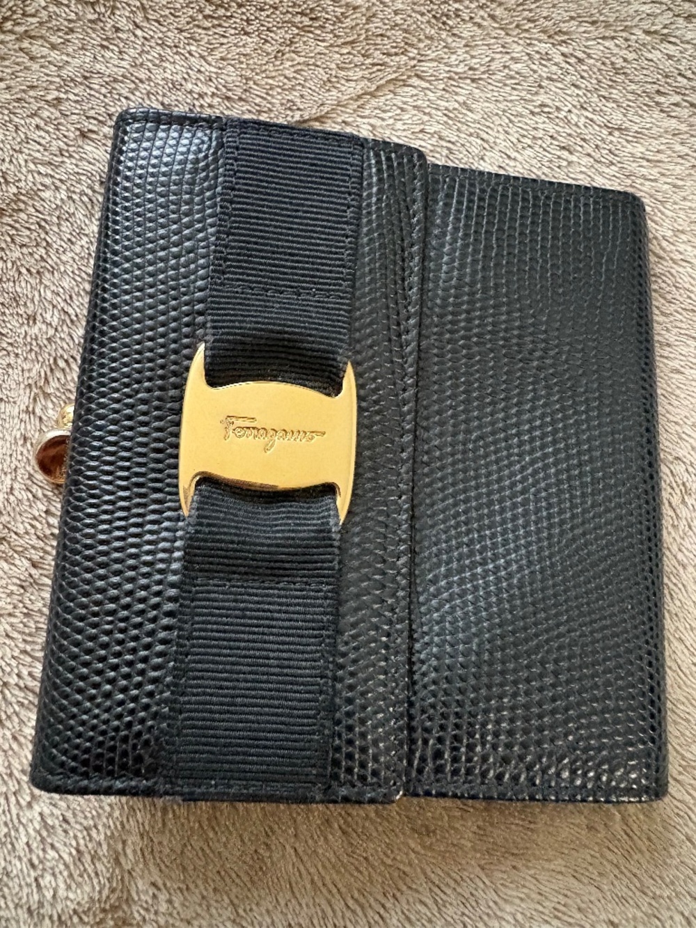 Ferragamo lizard embossed navy blue kiss lock compact wallet